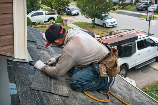 Professional Roof Replacement technician working in Mapleton, KS